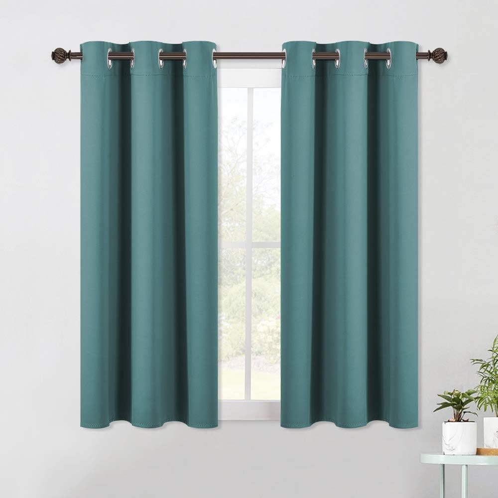 NICETOWN Living Room Window Curtain Panels, Thermal Insulated Solid Grommet Blackout Draperies/Drapes (Sea Teal, 1 Pair, 42 by 54-Inch)