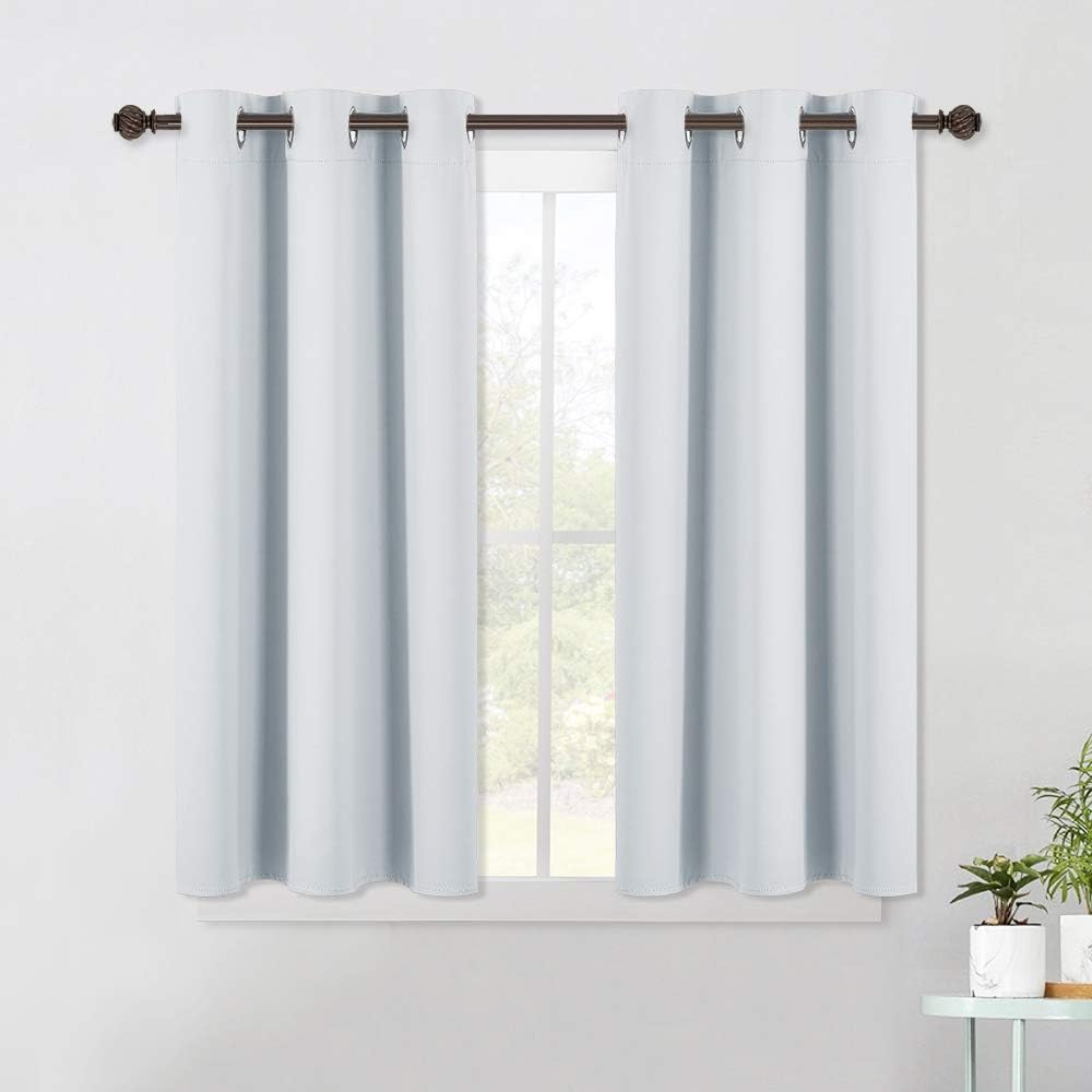 NICETOWN Room Darkening Draperies Curtains Panels, Window Treatment Thermal Insulated Grommet Room Darkening Curtains/Drapes for Bedroom…