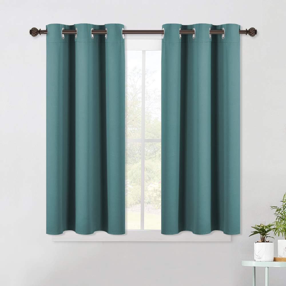 NICETOWN Bedroom Curtain Panels Blackout Draperies, Thermal Insulated Solid Grommet Blackout Curtains/Drapes (Sea Teal, One Pair, 42 by…
