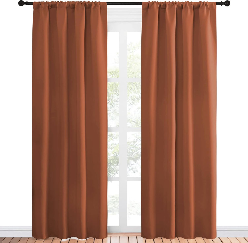 NICETOWN Blackout Curtains and Drapes - Thermal Insulated Solid Rod Pocket Blackout Draperies/Panels (Burnt Orange, 1 Pair, 42 by 84 inches)