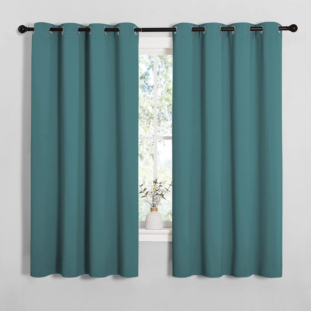 NICETOWN Bedroom Curtain Panels Blackout Draperies, Thermal Insulated Solid Grommet Blackout Curtains/Drapes (Sea Teal, One Pair, 55 by…