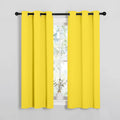 NICETOWN Window Curtain Panels, Thermal Insulated Solid Grommet Draperies/Drapes for Basement (Bright Yellow, 1 Pair, 34 by 54-inch)