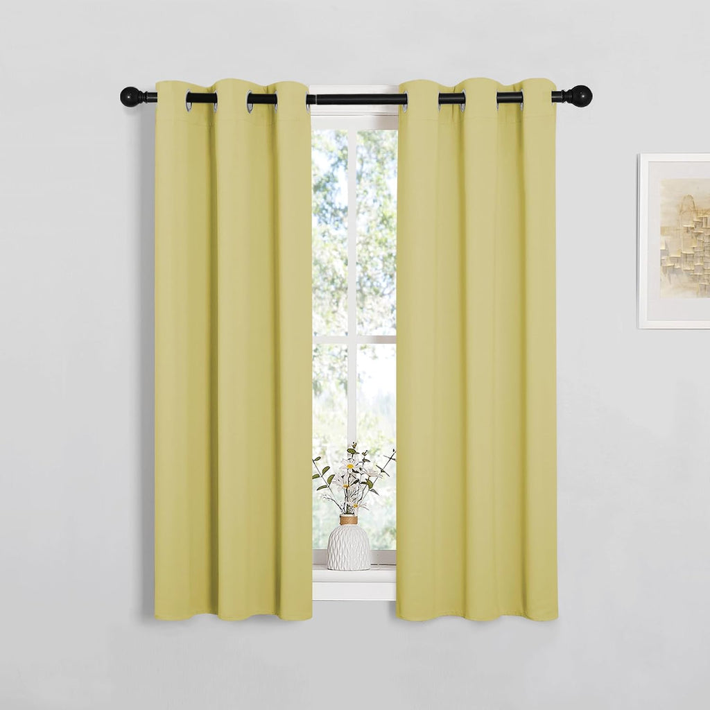 NICETOWN Window Curtain Panels, Thermal Insulated Solid Grommet Blackout Draperies/Drapes for Basement (Paler Yellow, 1 Pair, 29 by 45-inch)