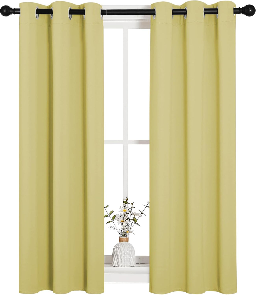 NICETOWN Window Curtain Panels, Thermal Insulated Solid Grommet Blackout Draperies/Drapes for Basement (Paler Yellow, 1 Pair, 29 by 45-inch)