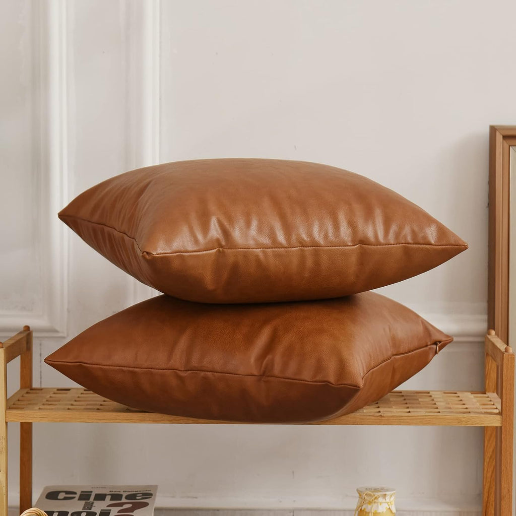 Tosewever Faux Leather Throw Pillow Covers, 18 x 18 inch Set of 2 Luxury Cognac Brown Modern Pillowcases Solid Decorative Square Cushion Ca…