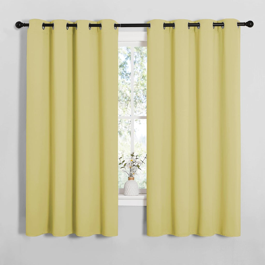 NICETOWN Bedroom Curtain Panels Blackout Draperies, Thermal Insulated Solid Grommet Blackout Curtains/Drapes (Paler Yellow, 1 Pair, 55 by…