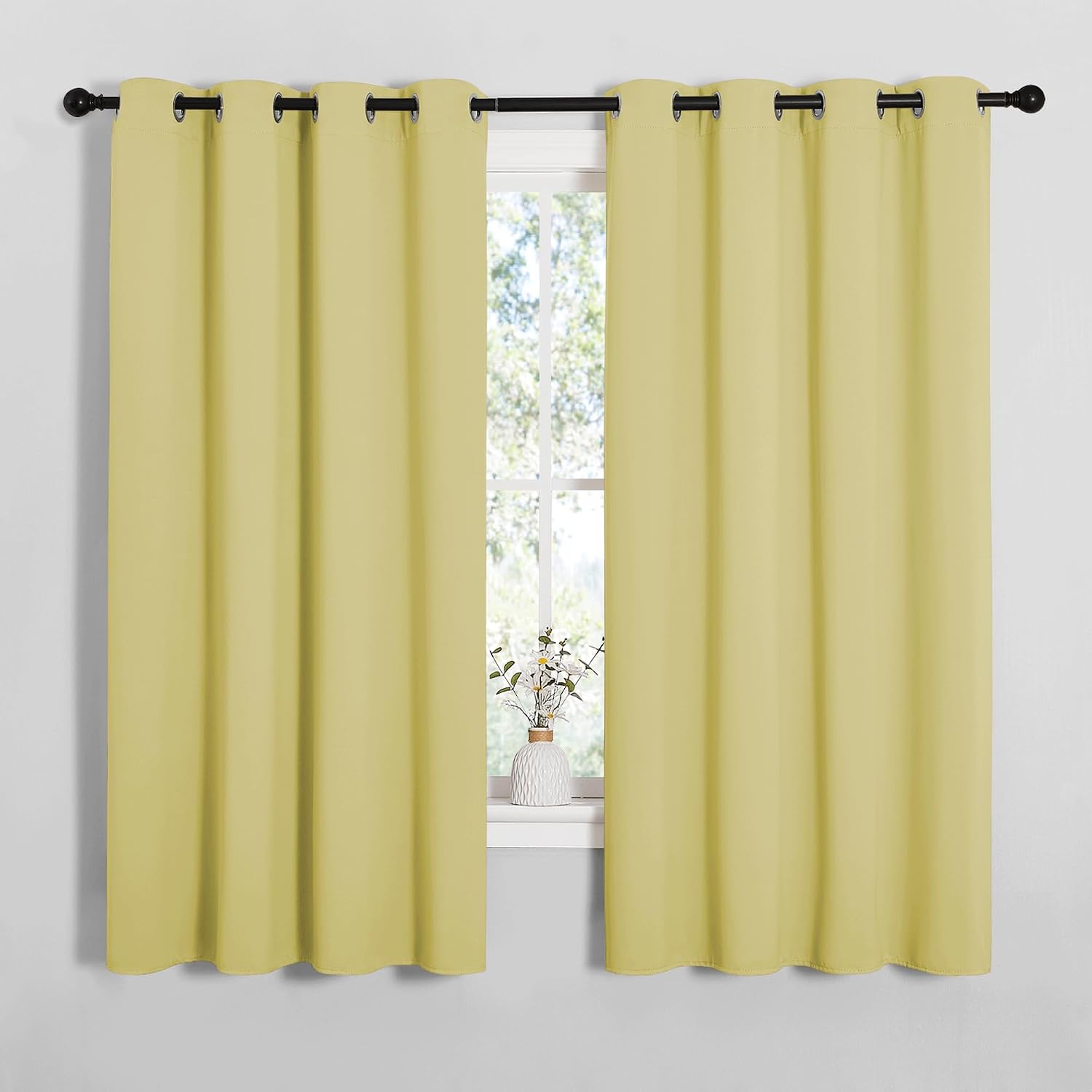 NICETOWN Bedroom Curtain Panels Blackout Draperies, Thermal Insulated Solid Grommet Blackout Curtains/Drapes (Paler Yellow, 1 Pair, 55 by…