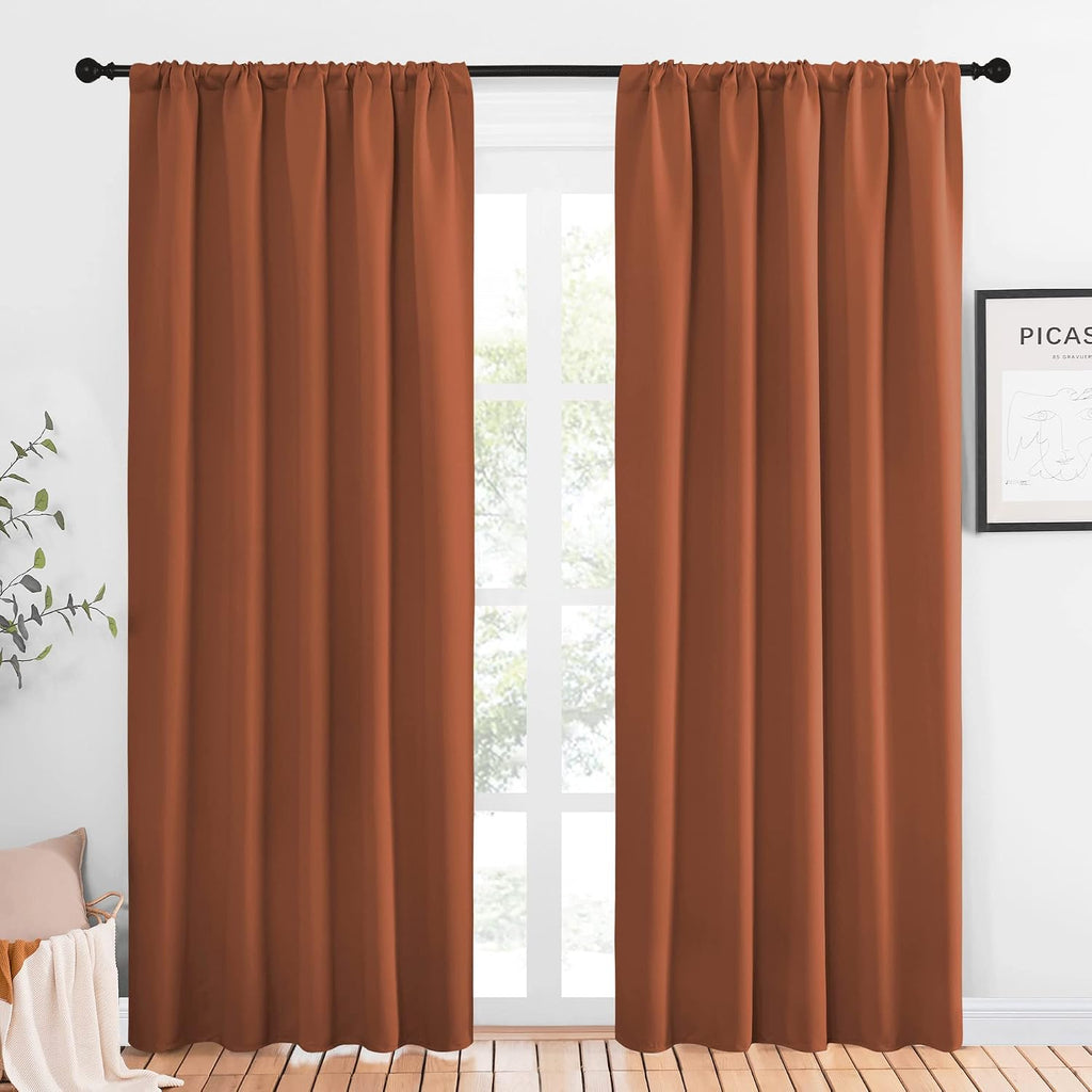 NICETOWN Blackout Curtains and Drapes - Thermal Insulated Solid Rod Pocket Blackout Draperies/Panels (Burnt Orange, 1 Pair, 52 by 84 inches)