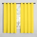 NICETOWN Bedroom Curtain Panels Draperies, Thermal Insulated Solid Grommet Curtains/Drapes (Bright Yellow, 1 Pair, 55 by 68-inch)