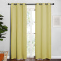 NICETOWN Window Curtain Panels, Thermal Insulated Solid Grommet Blackout Draperies/Drapes for Basement (Paler Yellow, 1 Pair, 34 by 84-inch)