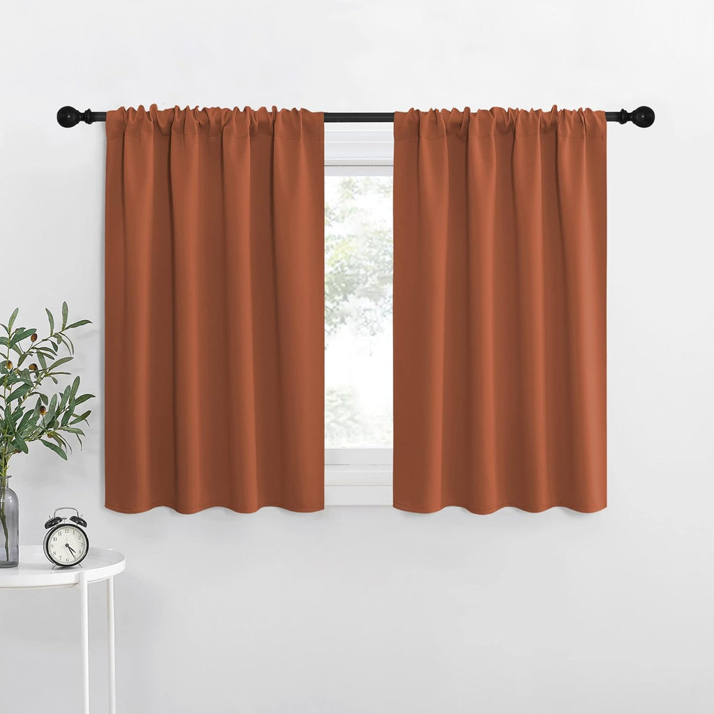 NICETOWN Blackout Curtains and Drapes - Thermal Insulated Solid Rod Pocket Blackout Draperies/Panels (Burnt Orange, 1 Pair, 42 by 36 inches)