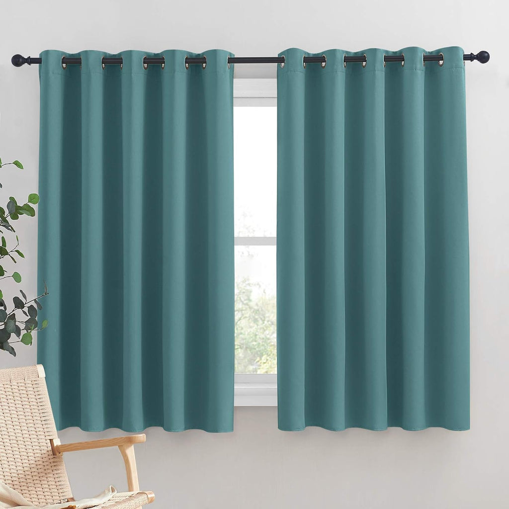 NICETOWN Bedroom Curtain Panels Blackout Draperies, Thermal Insulated Solid Grommet Blackout Curtains/Drapes (Sea Teal, One Pair, 70 by…