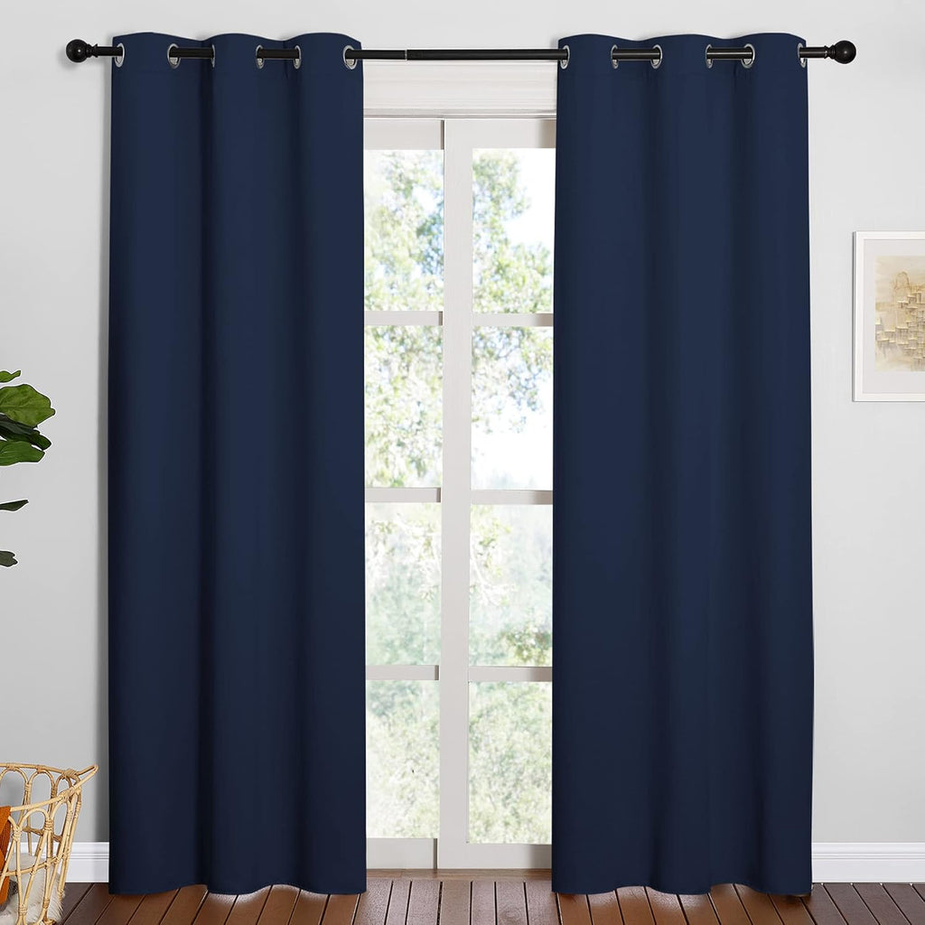 NICETOWN Window Treatment Energy Saving Thermal Insulated Solid Grommet Blackout Curtains/Drapes for Living Room (Navy, 1 Pair, 42 by…