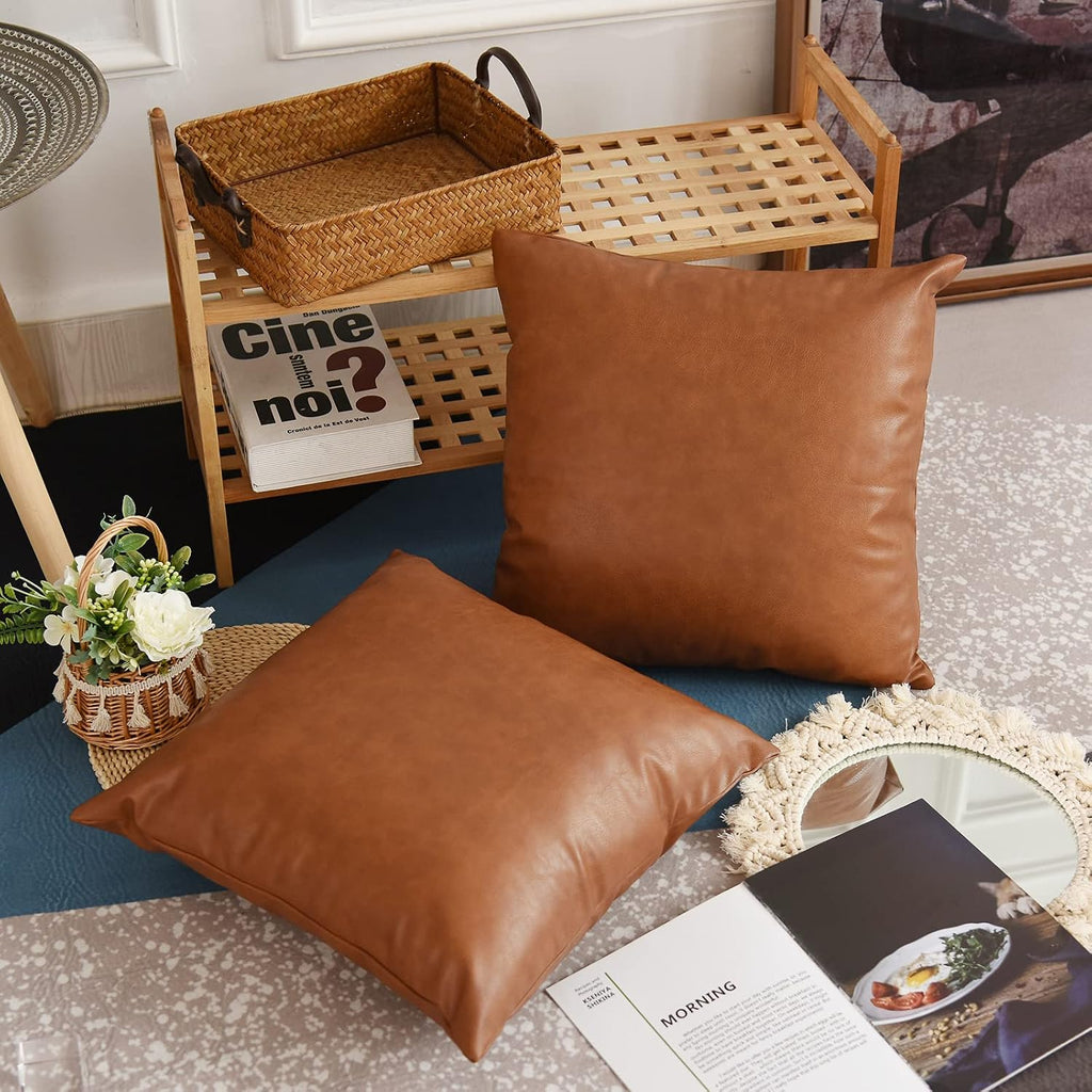 Tosewever Faux Leather Throw Pillow Covers, 18 x 18 inch Set of 2 Luxury Cognac Brown Modern Pillowcases Solid Decorative Square Cushion Ca…