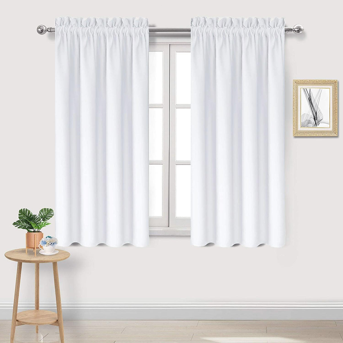 54"L x 42"W polyester curtains in Pure White