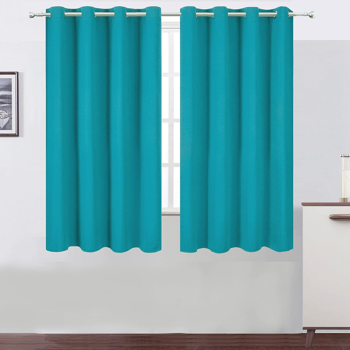 63"L x 66"W polyester curtains in Teal