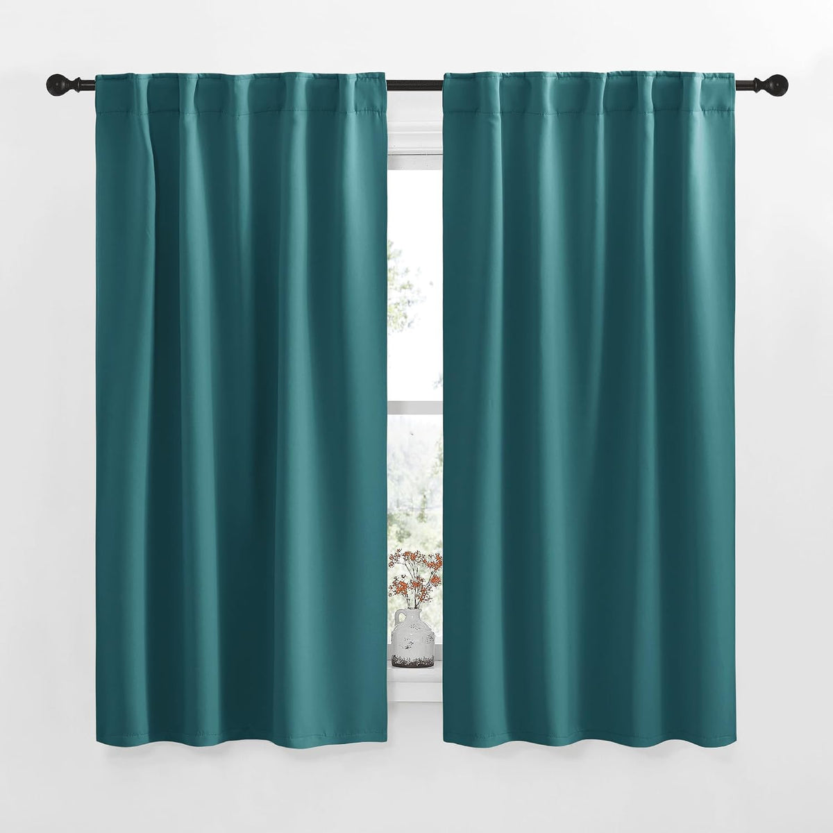 42"W x 50"L polyester curtains in Sea Teal