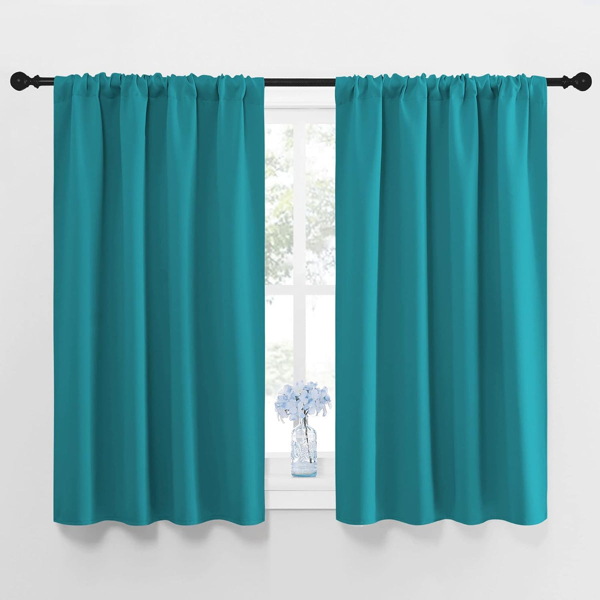 48"L x 42"W polyester curtains in Peacock Blue
