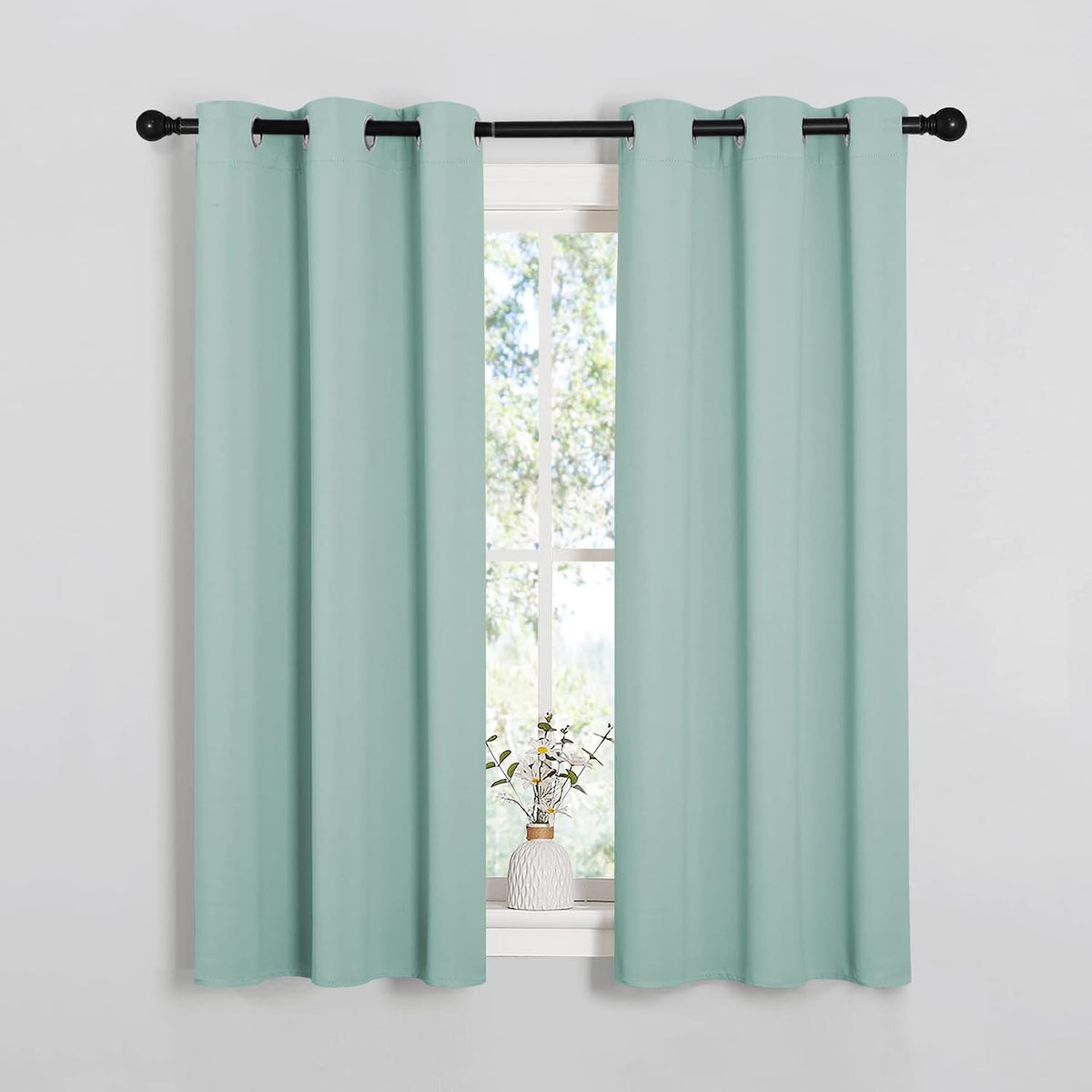 54"L x 34"W polyester curtains in Aqua