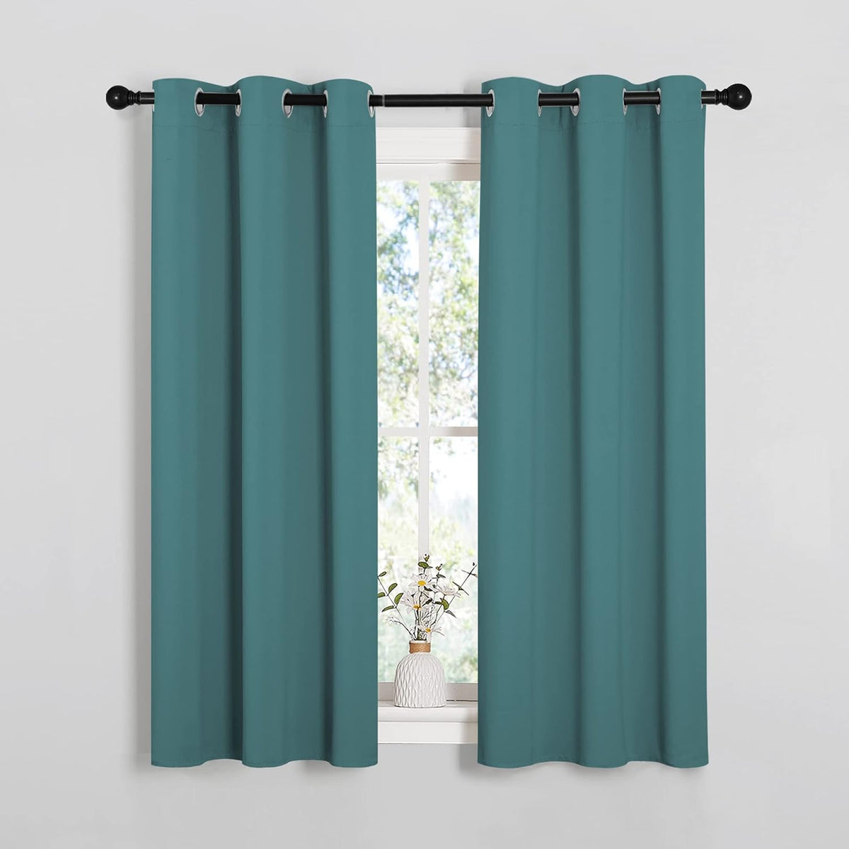 54"L x 34"W polyester curtains in Sea Teal