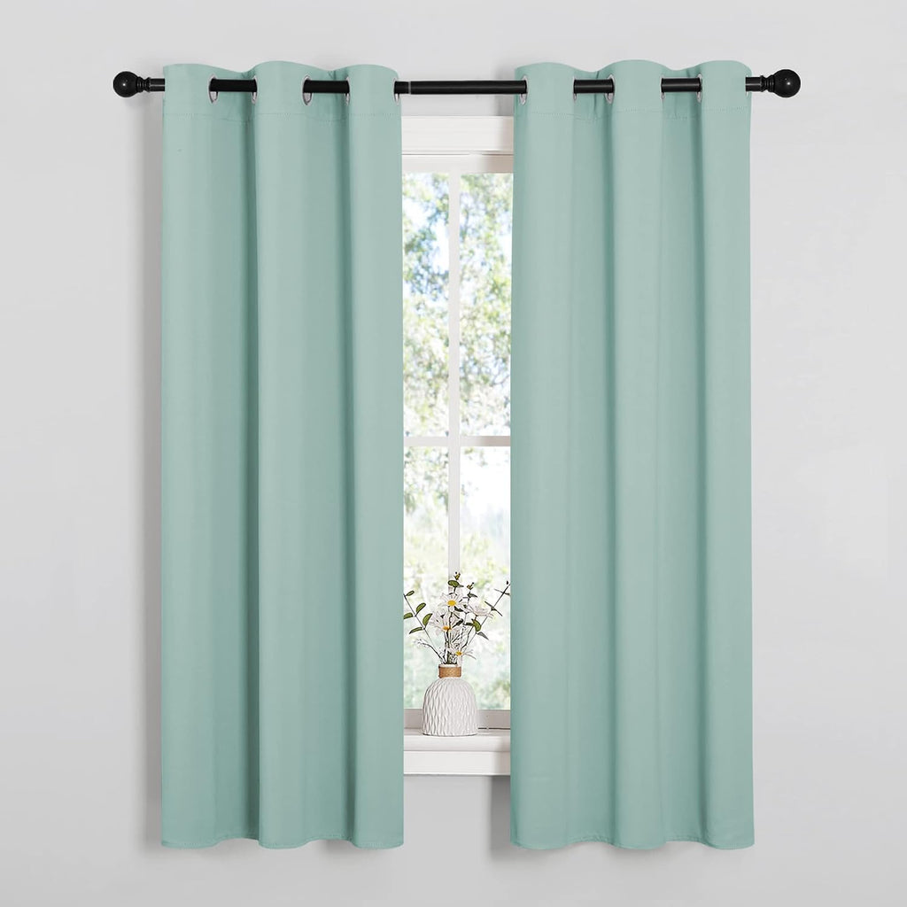 63"L x 34"W polyester curtains in Aqua