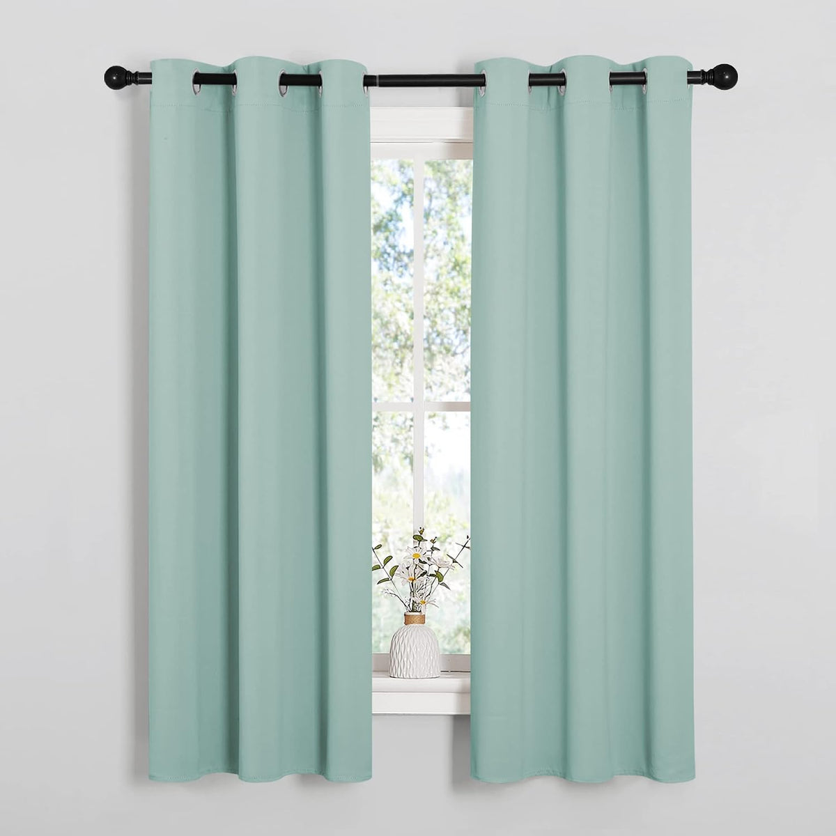 63"L x 34"W polyester curtains in Aqua