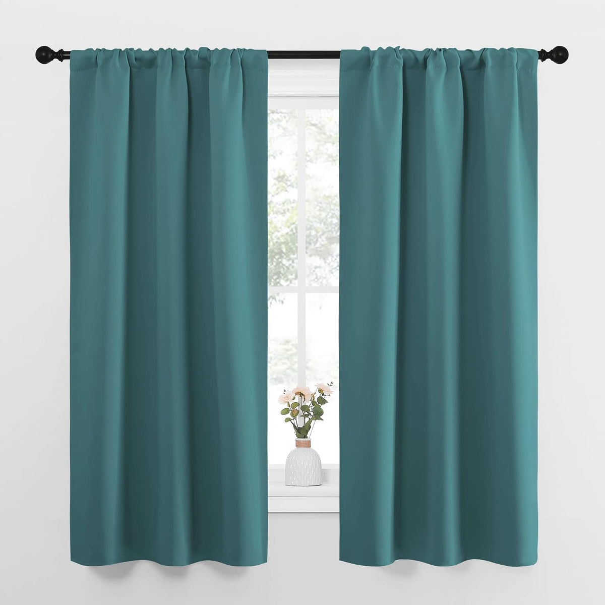 63"L x 34"W polyester curtains in Sea Teal