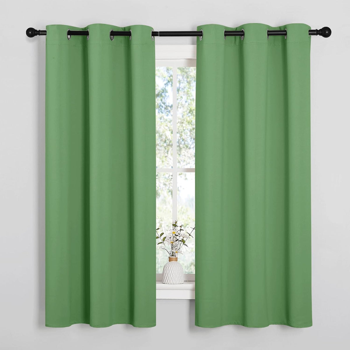 63"L x 42"W polyester curtains in Forest Green