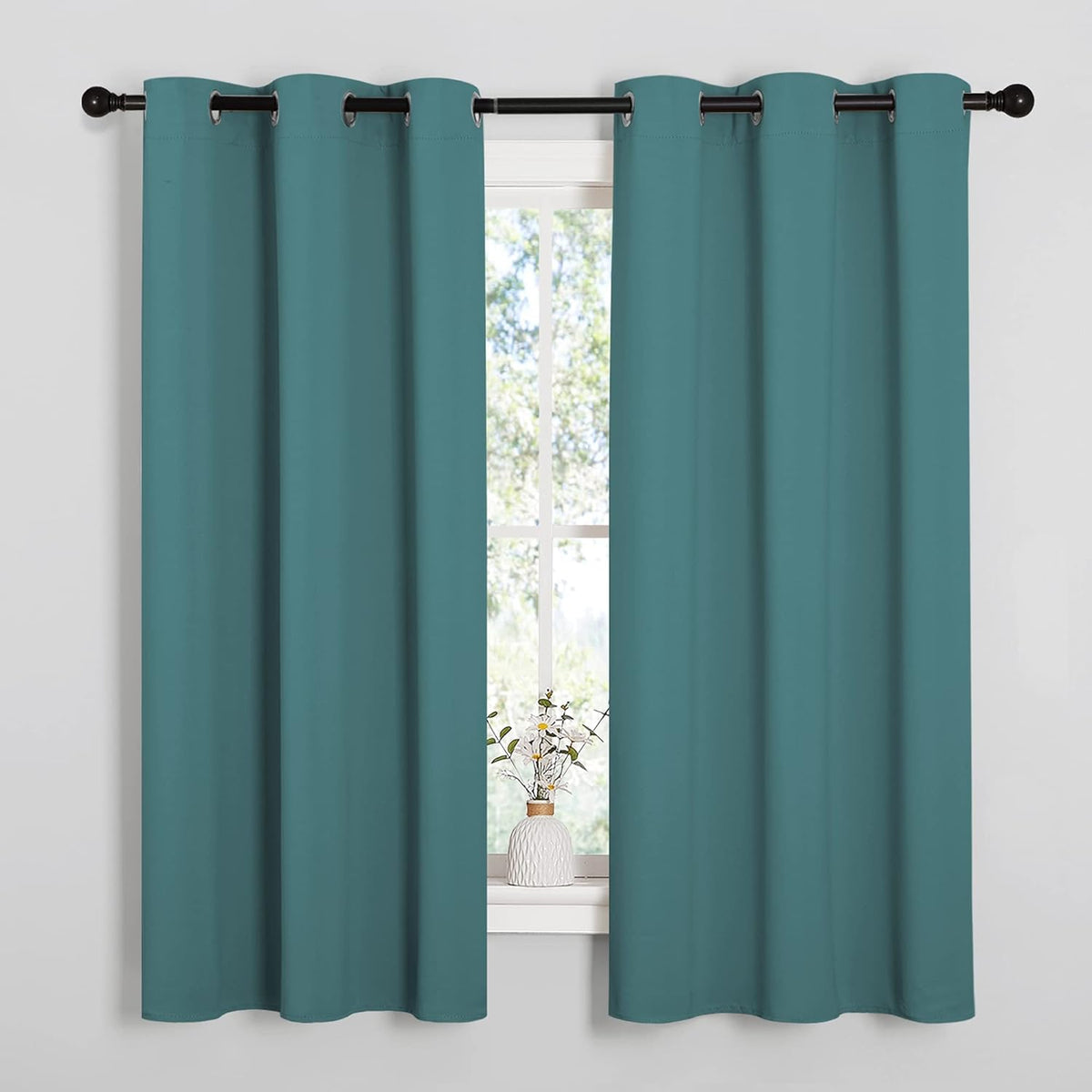 63"L x 42"W polyester curtains in Sea Teal