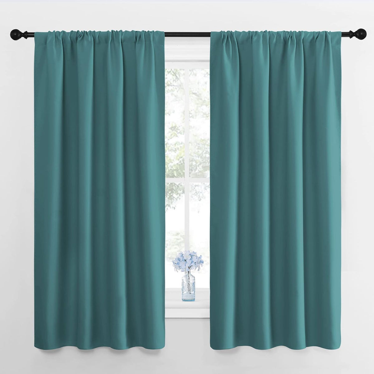 63"L x 42"W polyester curtains in Sea Teal