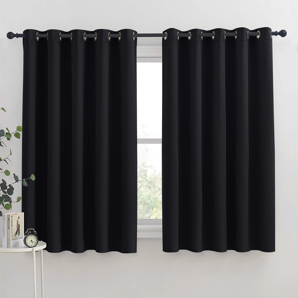 63"L x 70"W polyester curtains in Black