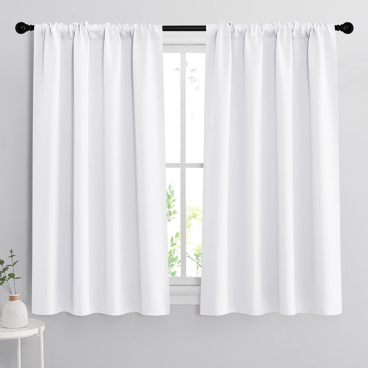 54"L x 42"W polyester curtains in Pure White